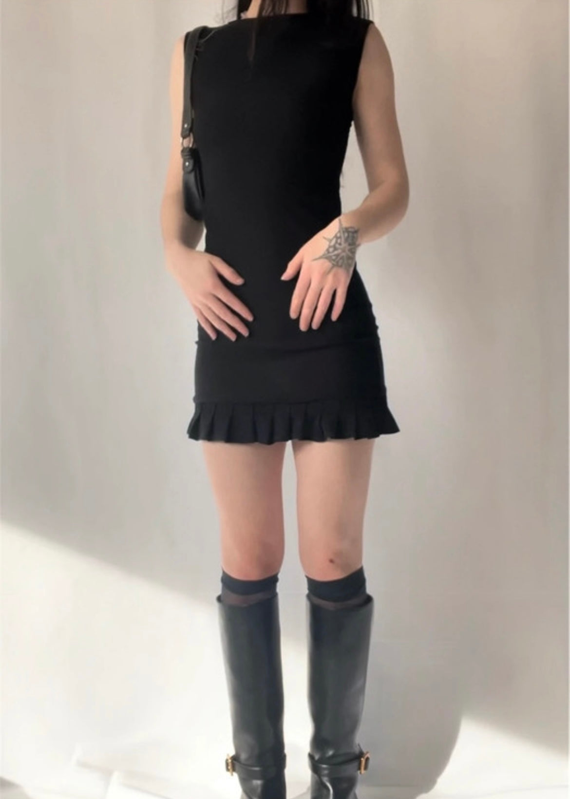 Robe à plissages